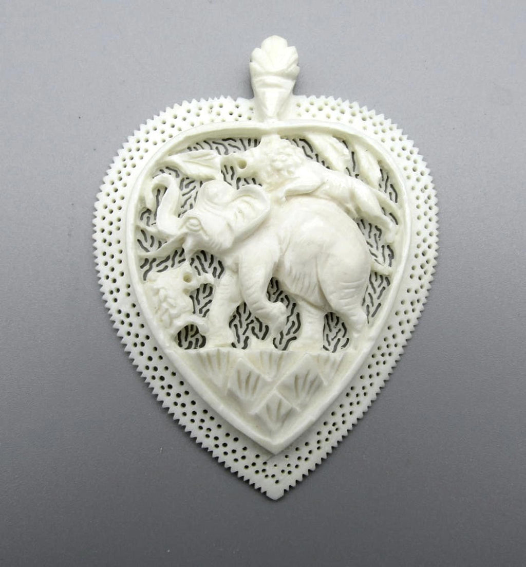 Intricately Carved Elephant Pendant Charm with Lion and Bird