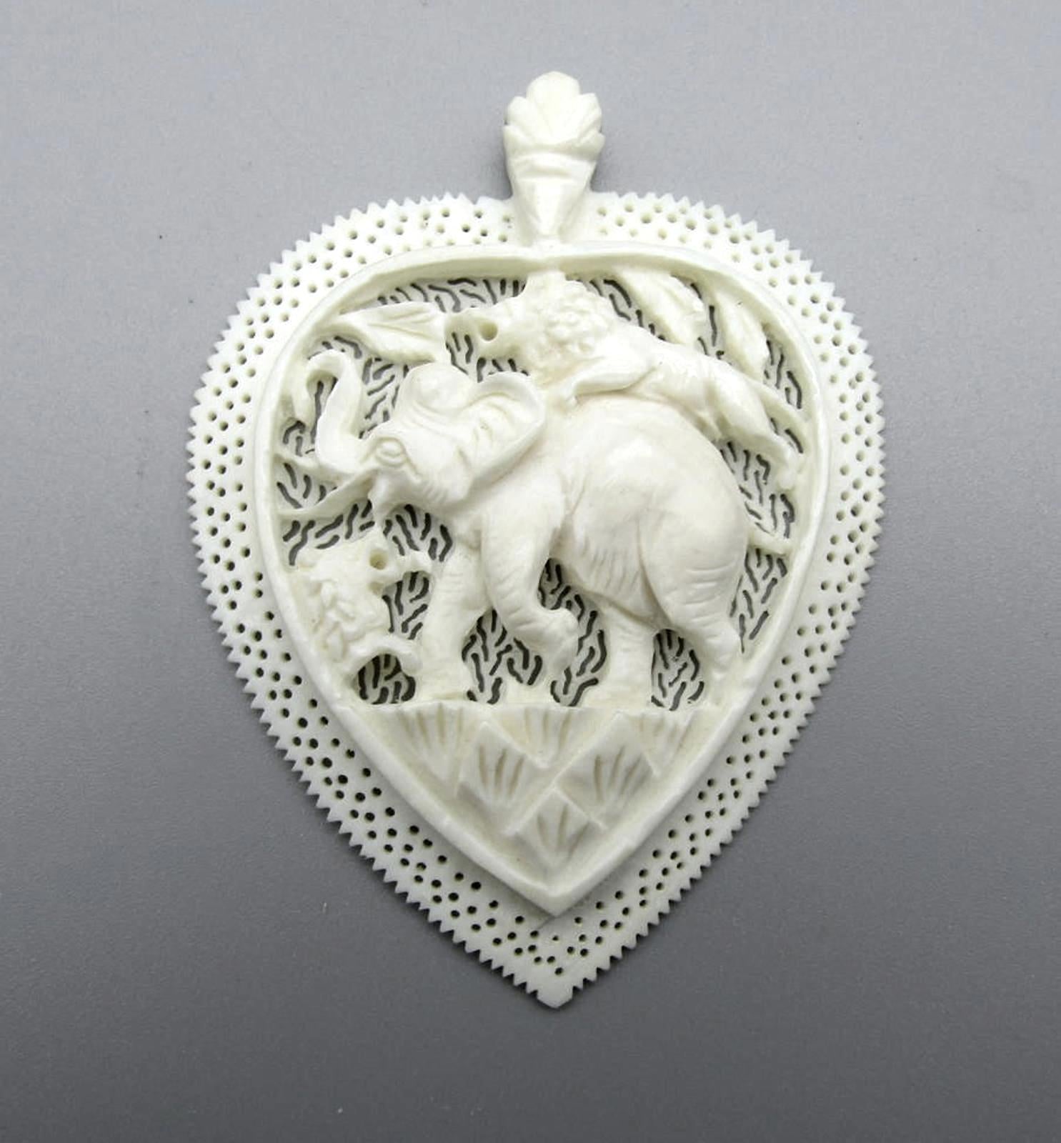 Intricately Carved Elephant Pendant Charm with Lion and Bird