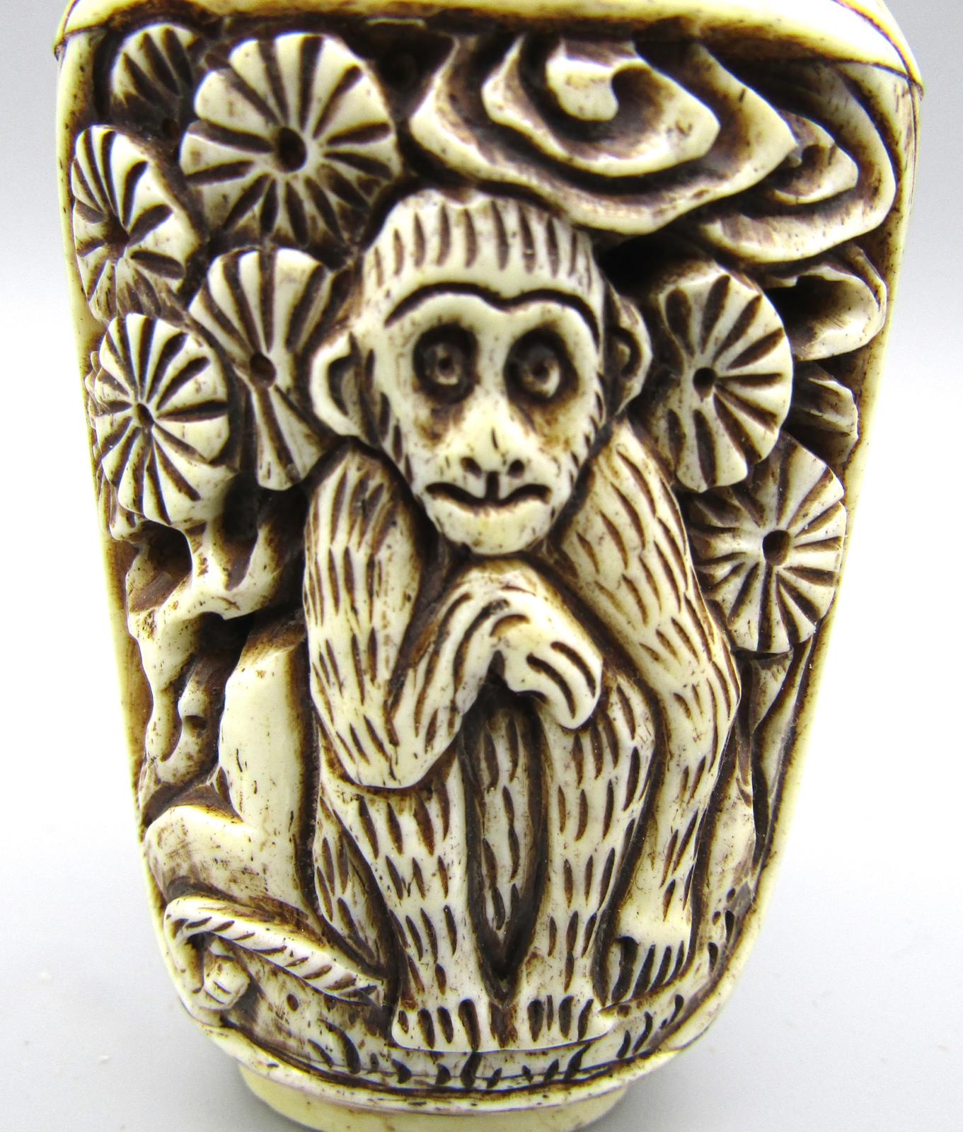 Vintage Chinese Carved Snuff Bottle with Monkey Motif