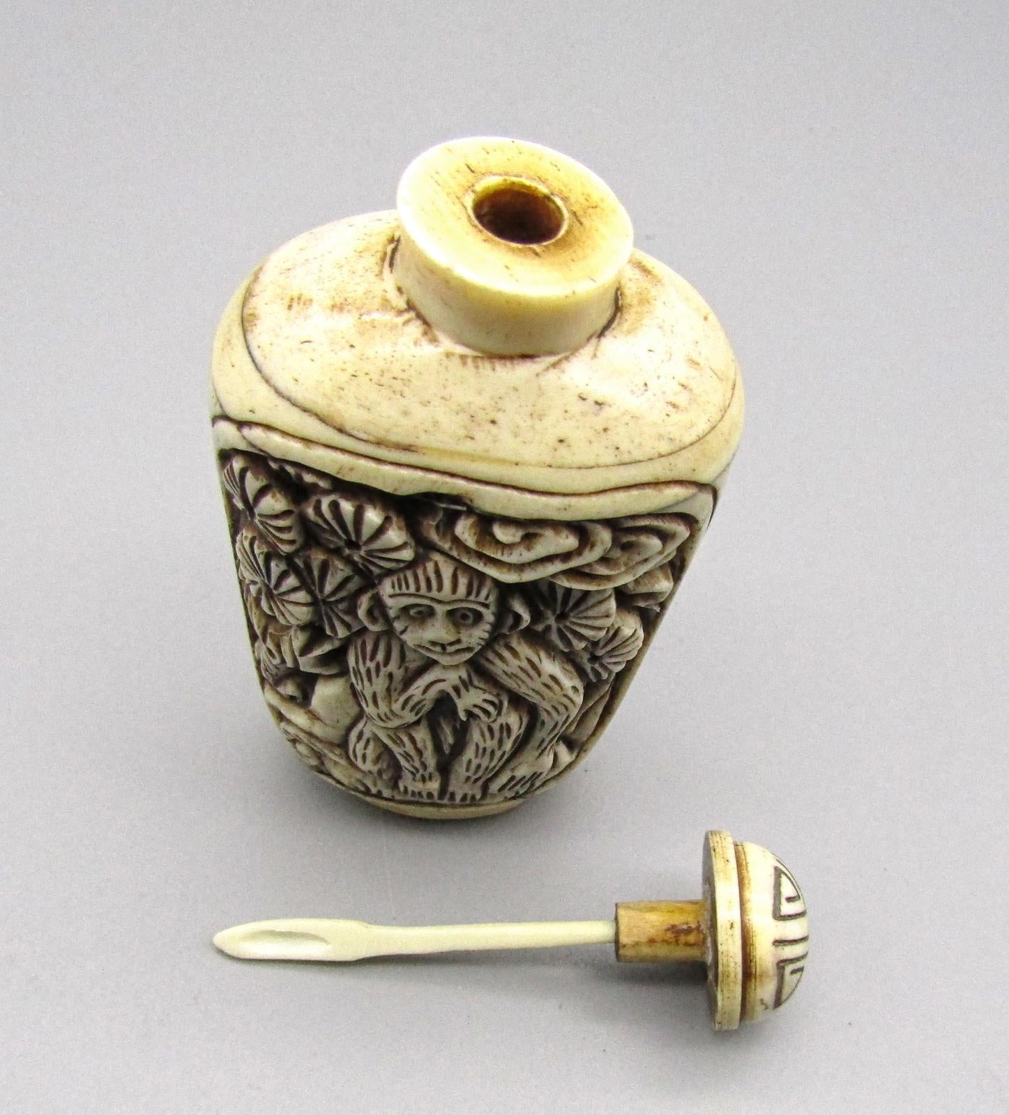 Vintage Chinese Carved Snuff Bottle with Monkey Motif