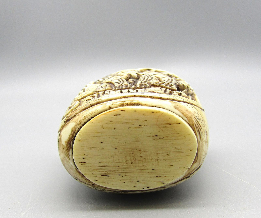Vintage Chinese Carved Snuff Bottle with Monkey Motif