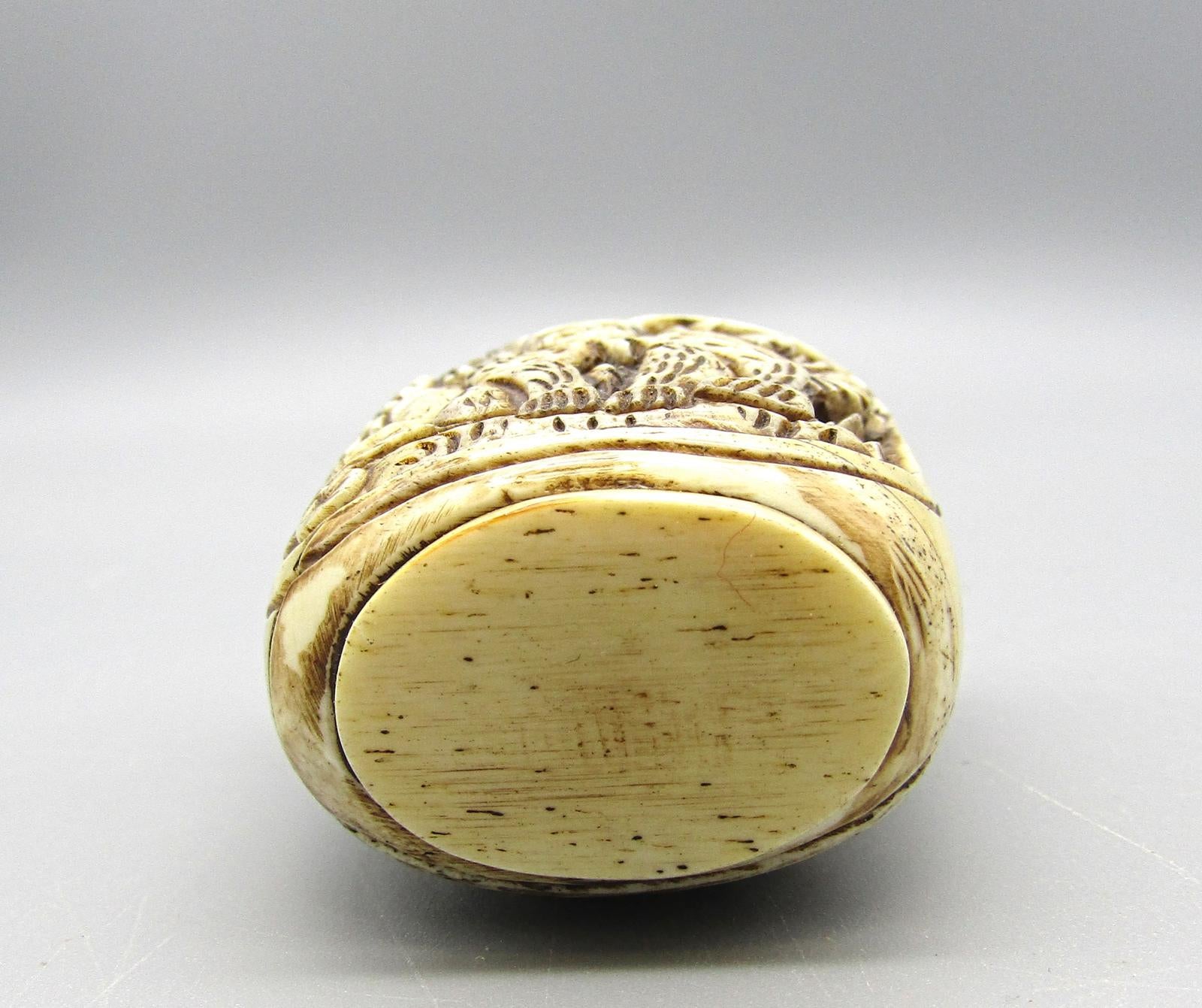 Vintage Chinese Carved Snuff Bottle with Monkey Motif