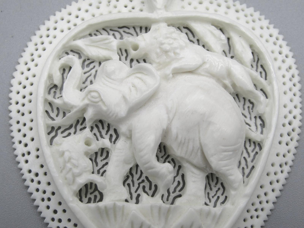 Intricately Carved Elephant Pendant Charm with Lion and Bird