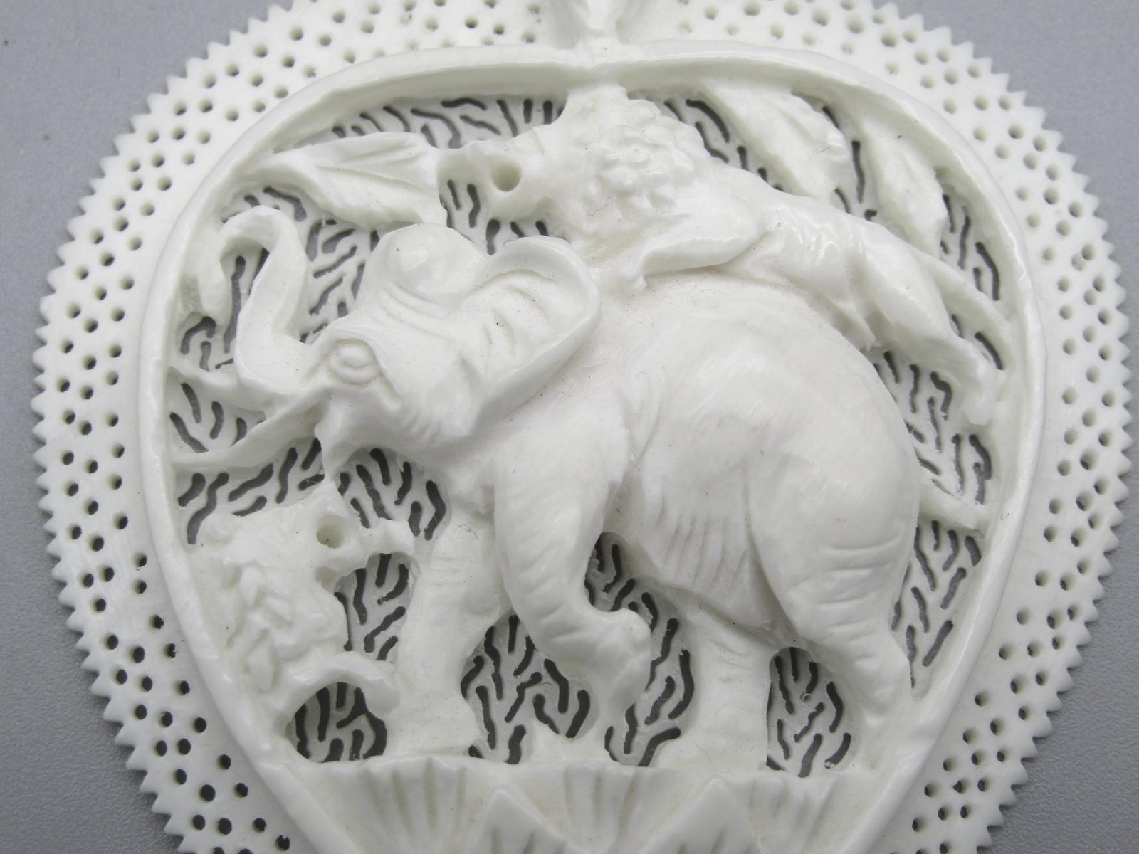 Intricately Carved Elephant Pendant Charm with Lion and Bird