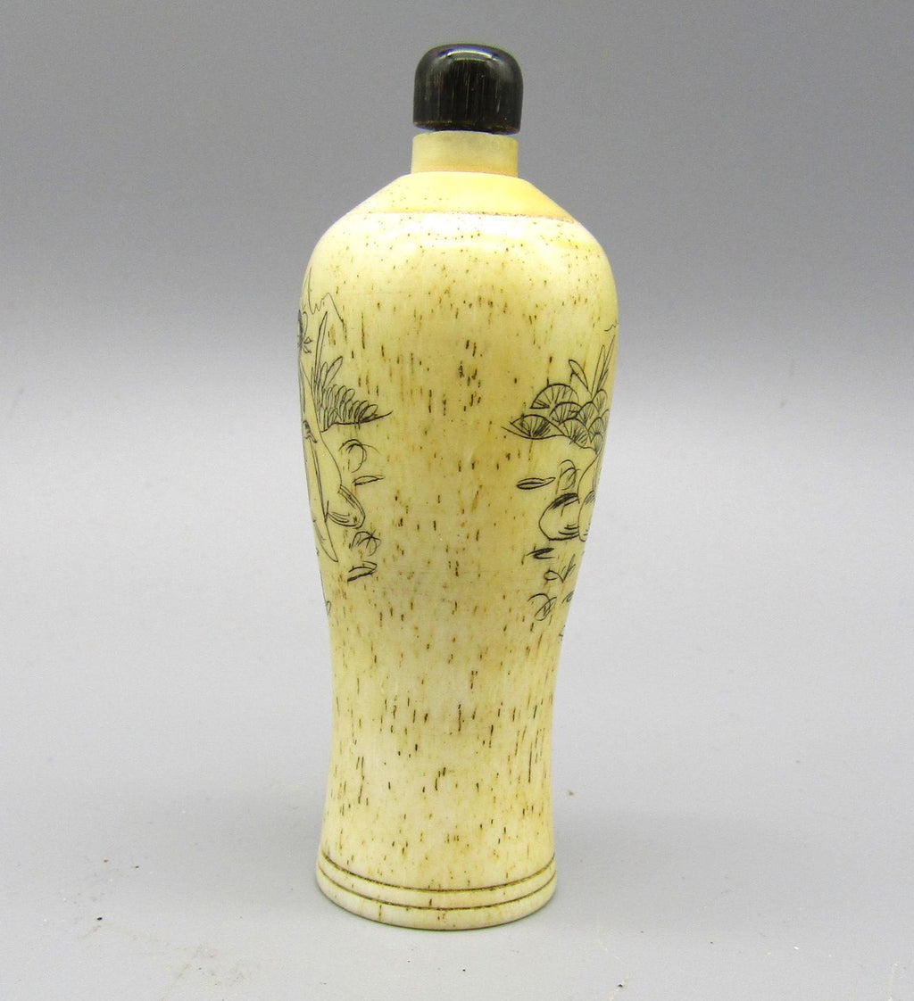 Antique Hand-Engraved Snuff Bottle with Asian Motifs