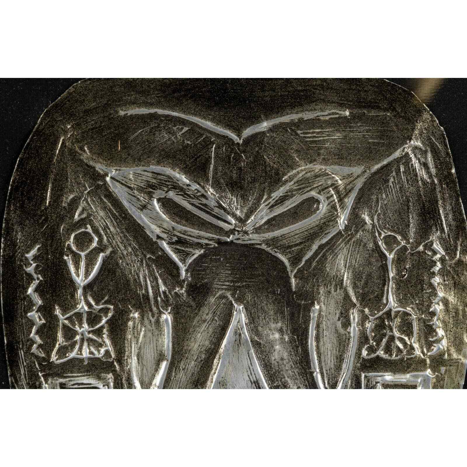 Metal Mask Art with Tribal Symbols Framed Under Glass